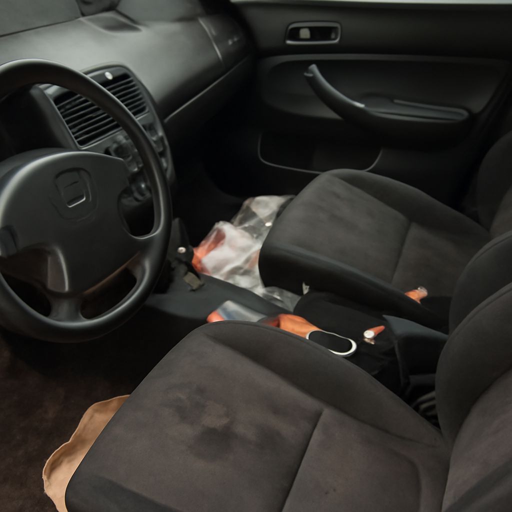 How to get stains out of car seats and remove stains from car upholstery